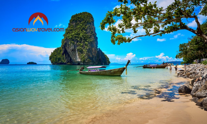 Longtail boats on a tropical beach in Thailand