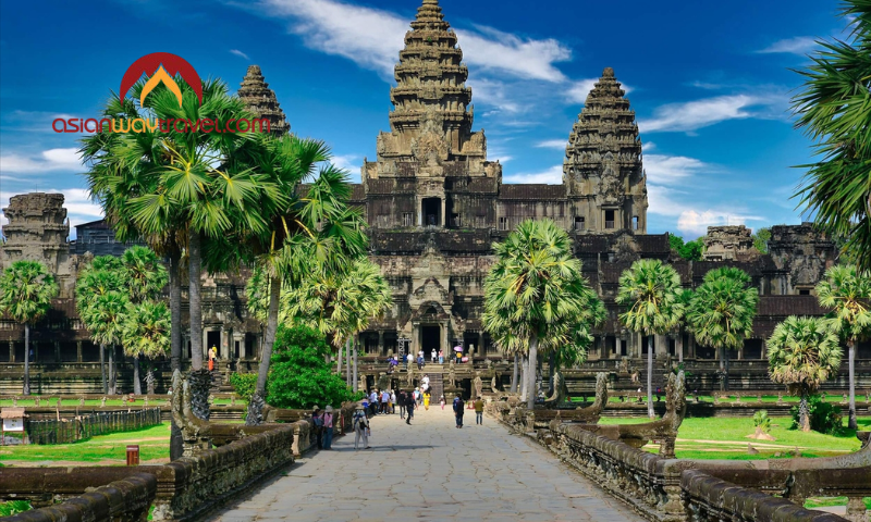 Angkor Wat temple entrance under a clear blue sky