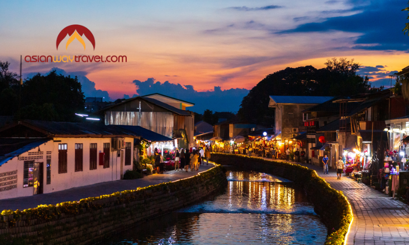 Chiang Mai night market by the canal at sunset