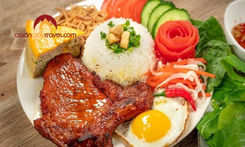 Vietnamese broken rice with grilled pork and fried egg