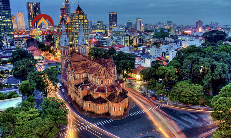 Saigon cityscape at dusk with Notre-Dame Cathedral Basilica