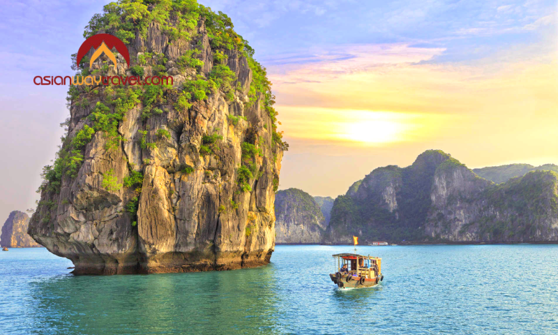 Sunset cruise among Halong Bay’s limestone karsts