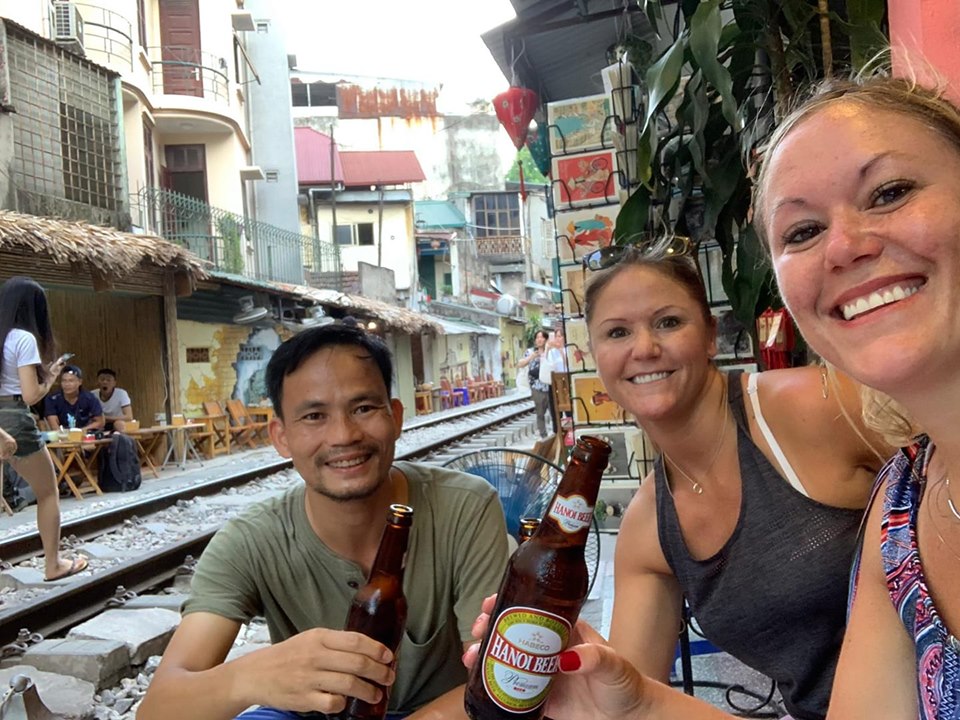 Having Beer while waiting for the train pass by - Vietnam and Cambodia Itinerary